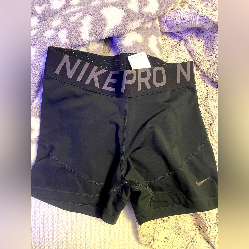 All black Nike pros